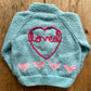 “Loved” Heart Handmade Cardigan Size Approx 0-6 months